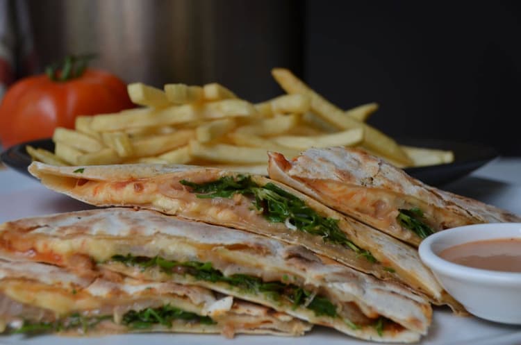 Piadina: Tomato, Mozzarella. chicken ham, pineapple, olives