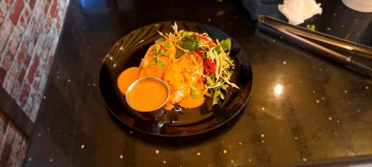 Grilled Chicken served with salad