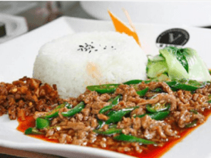 Beef with green pepper over rice